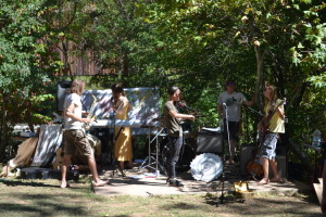 The band, Smokey Groove serenades the event goers with jazz fusion music while they peruse the silent auction and check out books from the BookBike. 